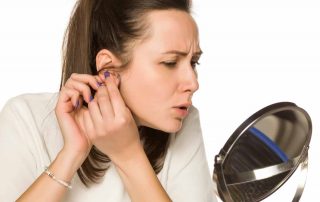 How Do You Get A Stuck Earring Back Off?